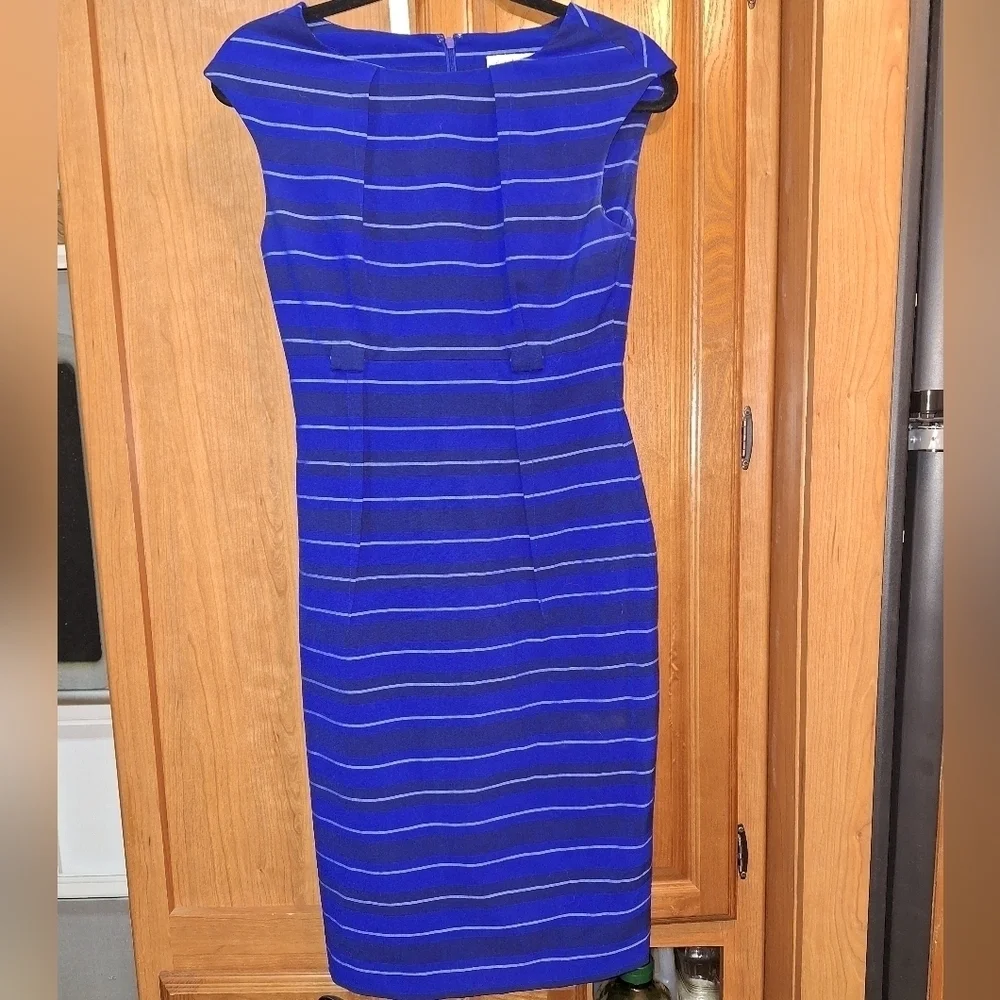 A Calvin Klein blue striped sleeveless maxi dress in a size 2.
